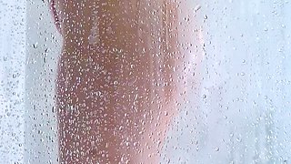 Watch her butt and bounce her curves in this explicit shower, 18+ only video