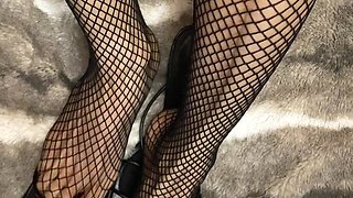 Fishnet in Open Toe Shoes with Red Nail Polish