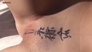 Writing Chinese On Her Stomach And Masturbate