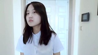 Chinese beauty with clothes after bondage