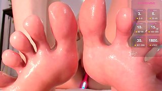 Oiled footjob