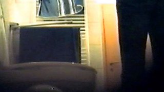 Girl using the toilet and filmed by voyeur 2