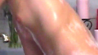 The Blonde Pussy Has Fun in the Bathtub