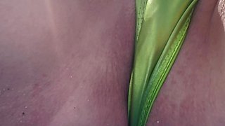 Horny Milf Artemisia Love at the Public Beach In Florida Showing her juicy Pussy in a Micro Bikini