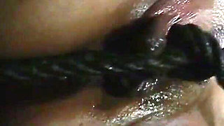 Caged Asian Witch Gets Her Orgasm From a Rough Knotted Rope