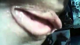 Close-up webcam footage of a woman's pussy and ass