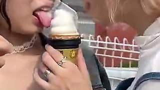 A Blonde and a Dark-haired Beauty Share Wild Passion Beneath the Open Sky. - a