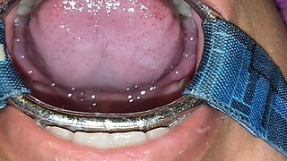 Putting It in Her Pussy and Then Straight Into Her Mouth with a Spider Gag in Her Open Mouth