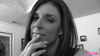 Vibrator on her clit and black dick in her muff