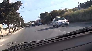MILF plays with cock in the car