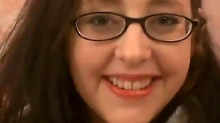 Tattooed brunette Audrey Alder mouth fucks big cock