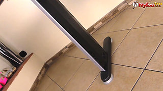 Jessica plays with her feet on the desk