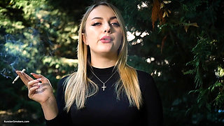 Hot Blonde Babe Smoking One Black Cigarettes in Nature
