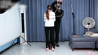 The Extreme Restraints of a Barefoot Girl, Playing with Her Bare Feet
