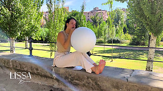 Inflating and Popping Them with Bare Feet Outdoors