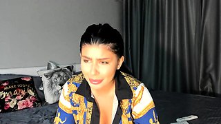 Amateur young brunette enjoys dildo on solo masturbation