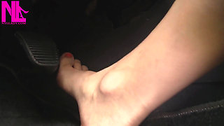 Nyllady with Her Bare Foot on Gas Pedal Driving