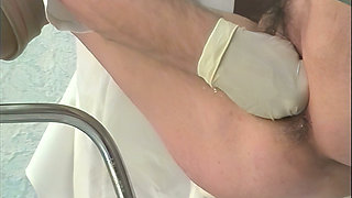 Gloved Doctor Stretches Hairy Pussy Wide Open