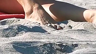 Hot MILF Masturbating on the Nudist Beach Got Caught on Camera