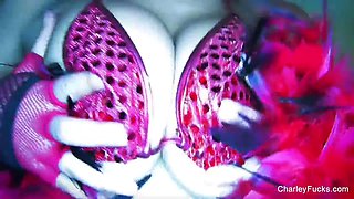 Dolled up Charley Chase plays with her pussy