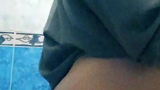 Jalbab Algerian Muslim woman shows her body behind hijab