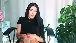 Tattood shemale tranny plays with ass during masturbation