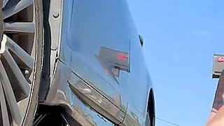 67 Tall Amazon Goddess Changes Her Tire - Big Feet in Frame