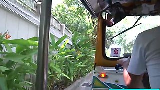 Petite Thai MILF riding in a Tuk Tuk