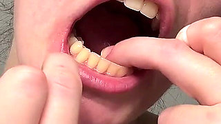 Flossing Teeth with Oral B Glide Dental Floss