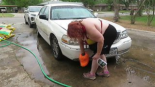 Sexy Mature bbw redhead  Nurse Vicki washes her car!