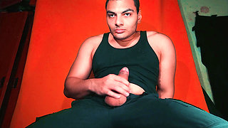 Masturbation of large penis on carrot colored background - GuitarJob - Guitar Masturbation