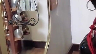 Mz30 - Latex Girl, Bound by Red Rope, Admiring Herself in Front of a Mirror