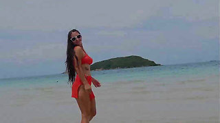 Orange Bikini Fun and Beauty Flashing on the Beach