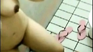 Busty Arab Stepmother spied on showering