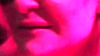 MILF with 2 Young Guys in a Swinger Club