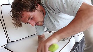 Mature woman with augmented large breasts (Melissa Lynn) orally pleasured the youthful man's erection.