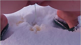 Femdom. Two Busty Women Piss Naked In The Snow, Then Make A Naked Guy Eat And Lick The Yellow Snow