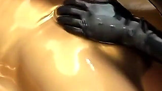 Latex Lovers Encased in Gold