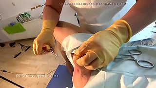 Dominatrix mistress April - clinical cock stitching