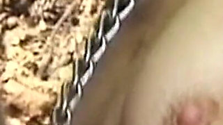 Hooded Mature Man Endures Clamps and Heavy Chains