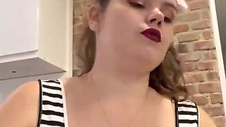 Smoking with red lipstick on