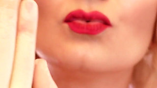 ASMR video: Latex nurse gloves. Doctor Santa girl teasing with smile and close ups. Arya Grander.