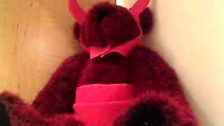 Busty babe playing with her big boobs