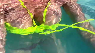 Artemisia Love flashing her juicy big tits underwater for you wearing a sexy bikini