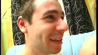 Horny old slut slides strap on into young guys asses