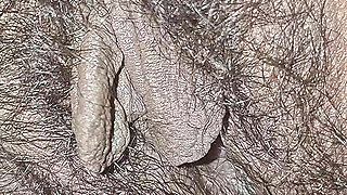 The village woman is showing her large pussy
