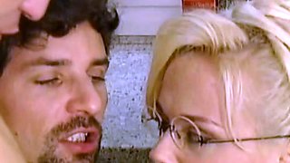 Busty lady in yellow and glasses gets double dicked
