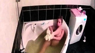 Peeking at stepdaughter Amy shaving in the bath