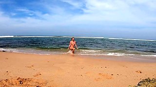 Blonde Babe's Naked Swim in the Ocean