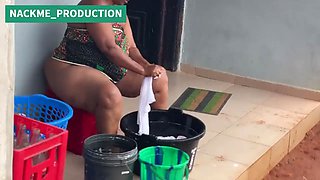African Mama Multitasks on a Sunday Morning
